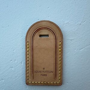 Authentic Louis Vuitton used luggage tag